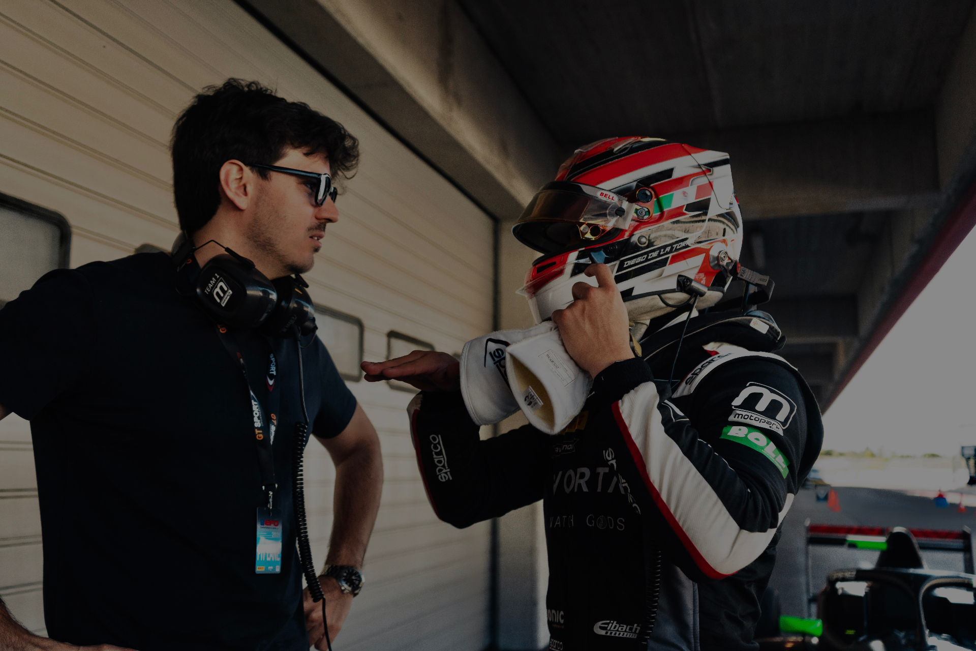 Diego de la Torre talking with the team in the pit lane at Portimão