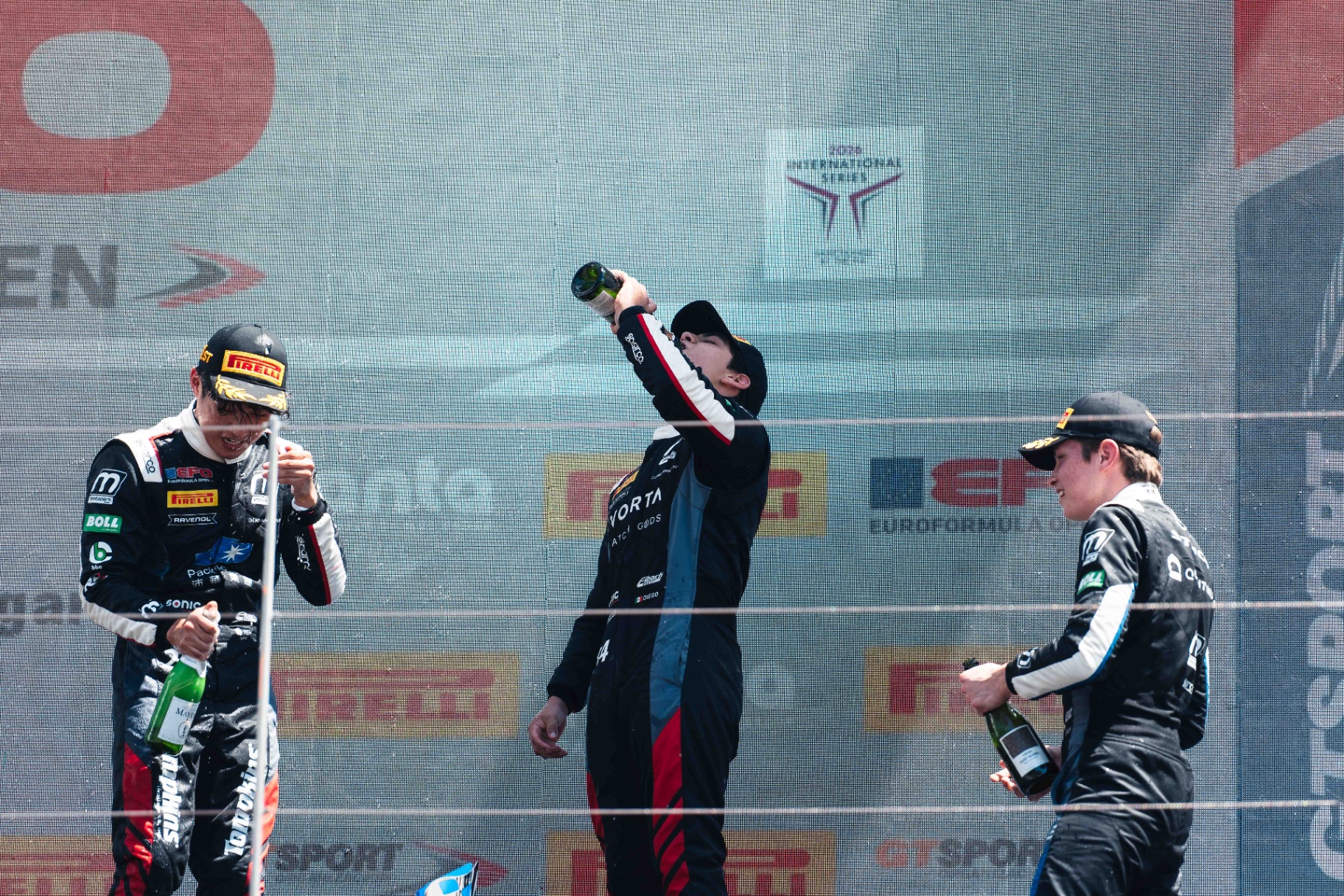 Diego de la Torre celebrating on the podium at Portimão